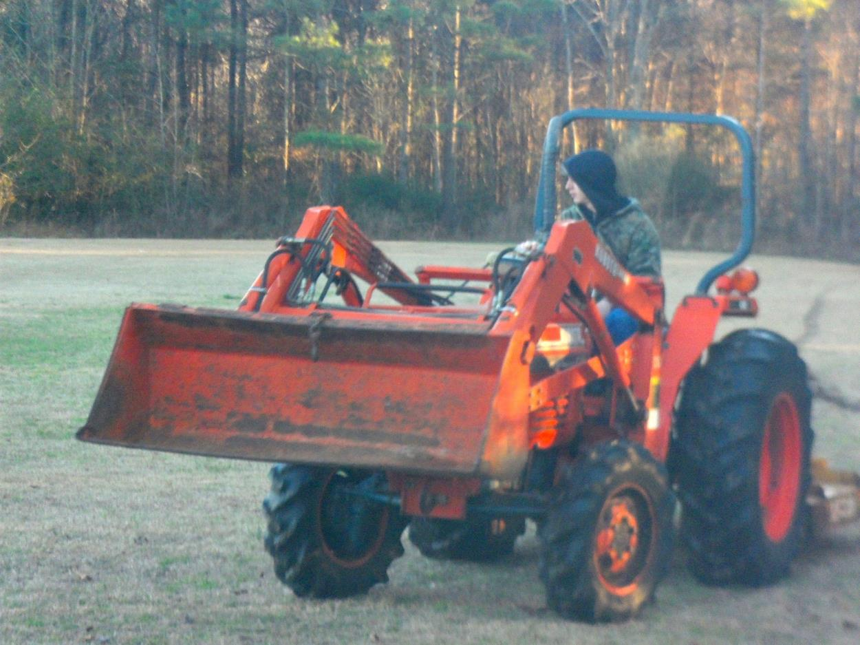 Equipment Transport Kubota tractor w front bucket and rear bush hog to Boulder uShip