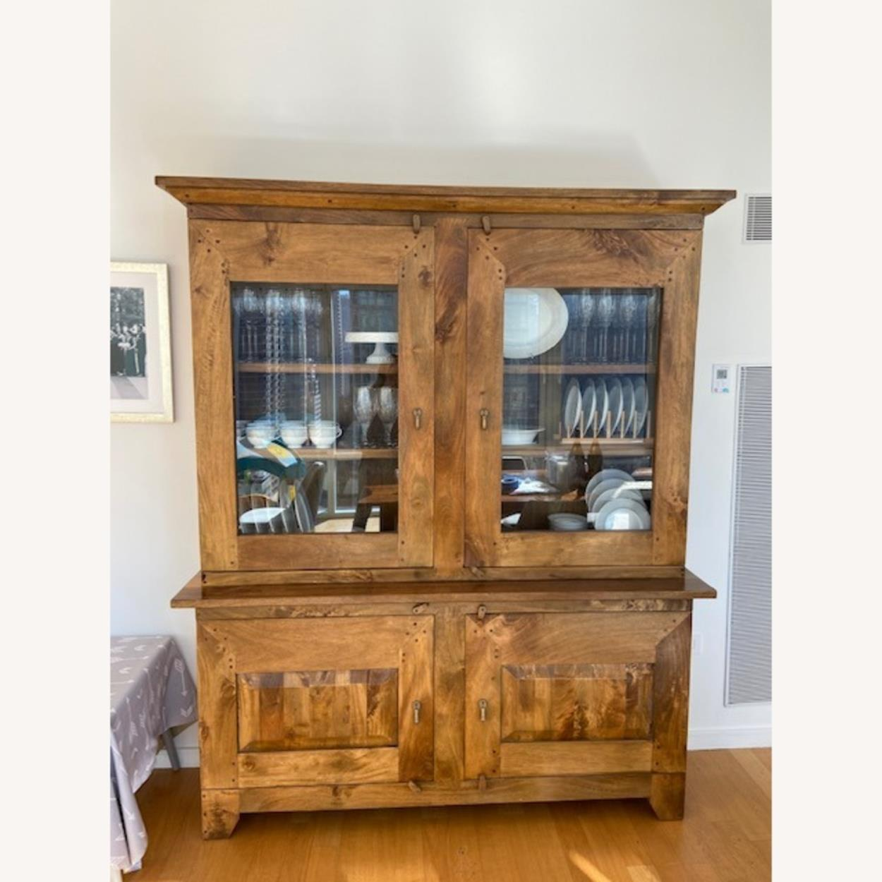 Deliver a Glass front large china (separates into 2 to