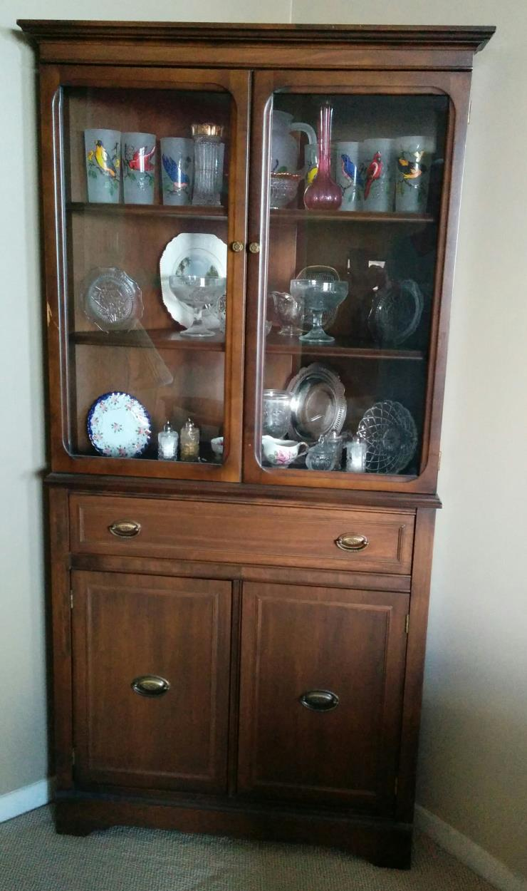 Cost to Ship a Wooden corner cupboard with glass doors to Abbotsford