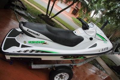 Ship a 2002 KAWASAKI 1200 STX-R 2stroke 3seater w/trailer to La Porte ...