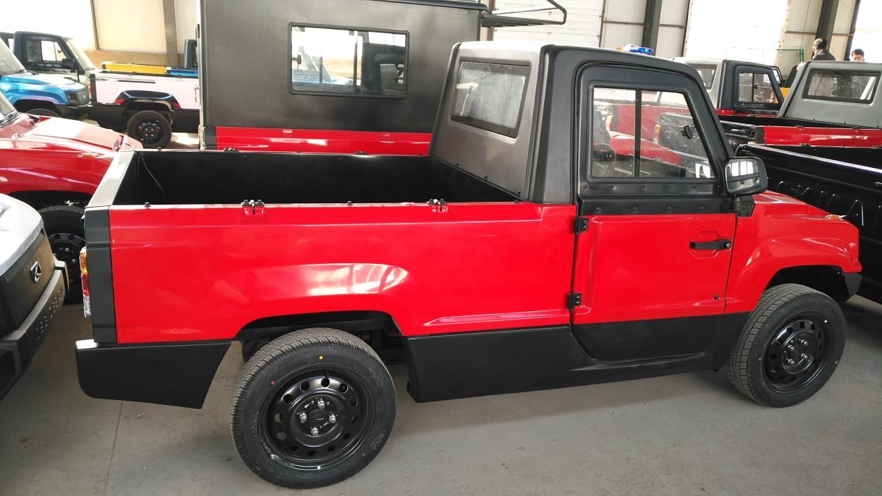 Ship a Electric mini pickup truck and motorcycle to Summerfield | uShip