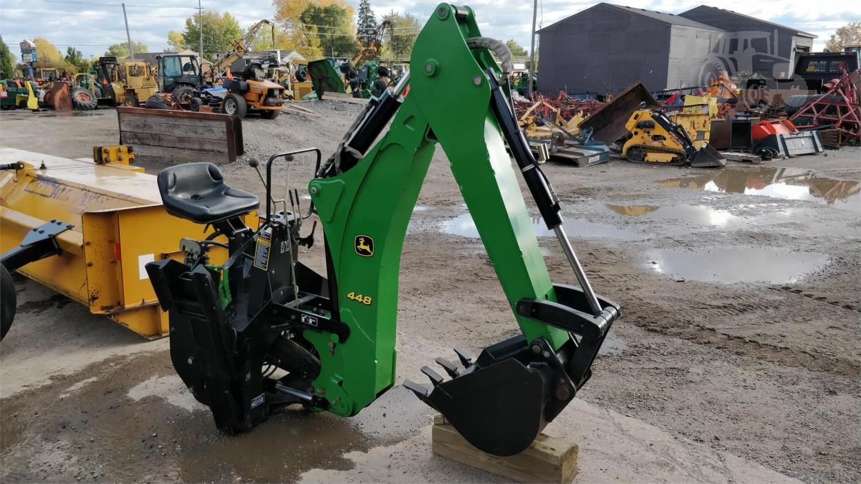 Cost to Transport a John Deere 448 compact tractor attachment to