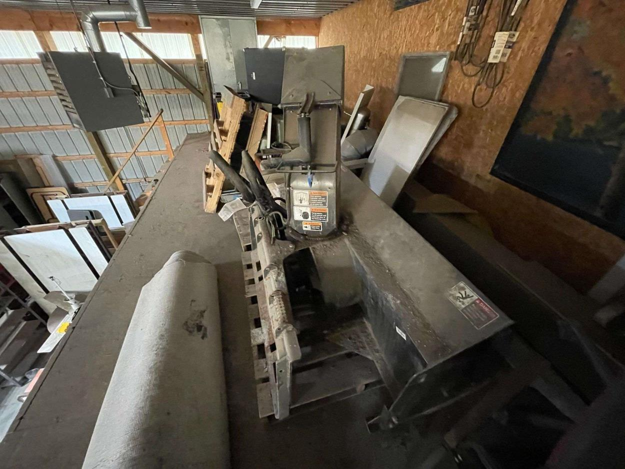 Cost to Ship a 2002 Mustang Skid Steer 2054 with attachments to