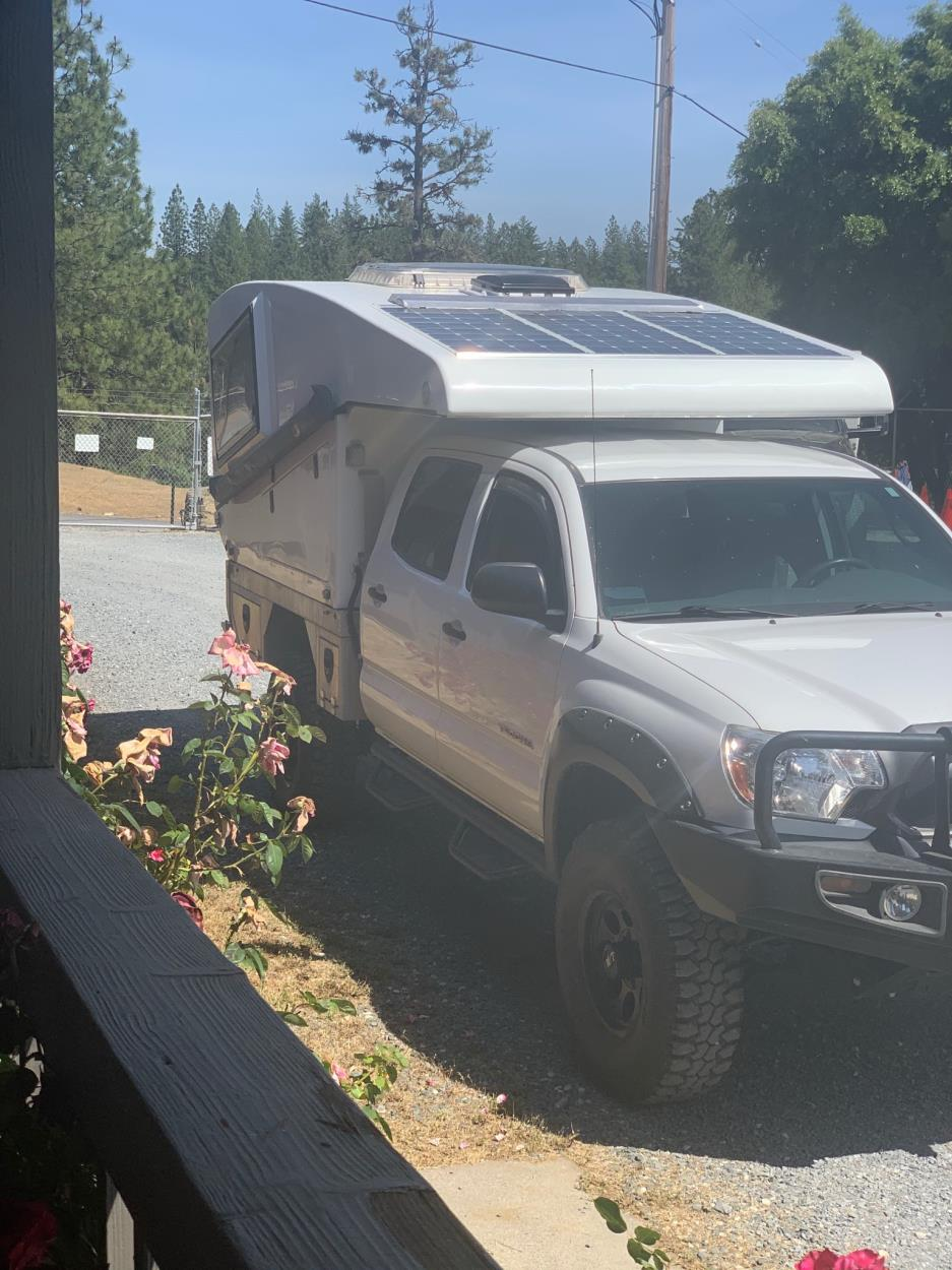 Cost to Ship a 2013 Toyota Tacoma w/ pop up truck camper in bed. to Seattle | uShip