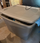 tv and 3 boxes