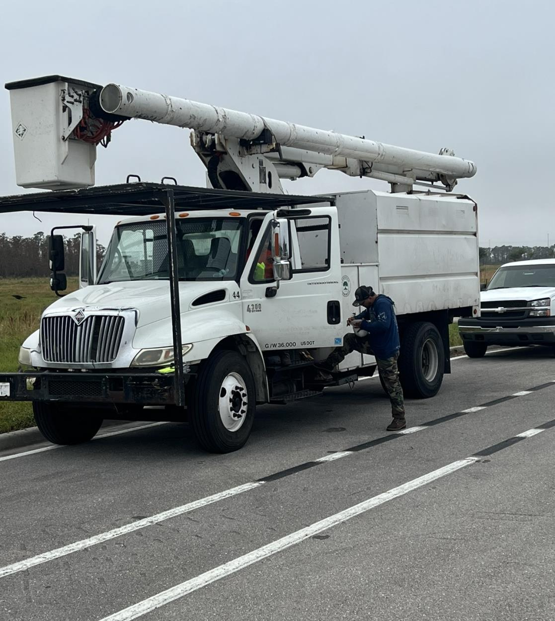 Equipment Movers International bucket truck. MUST use RGN Trailer to